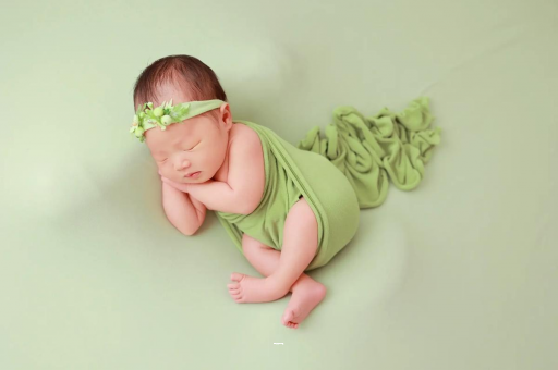 韩城宝宝多大才不会吐奶